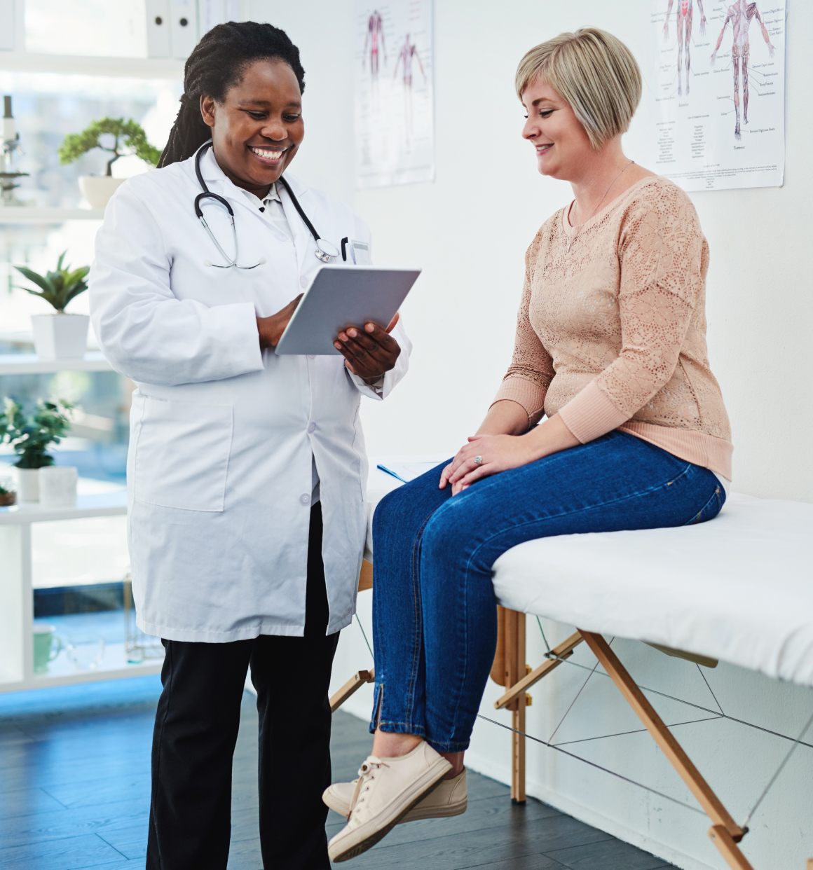 Nurse assisting woman