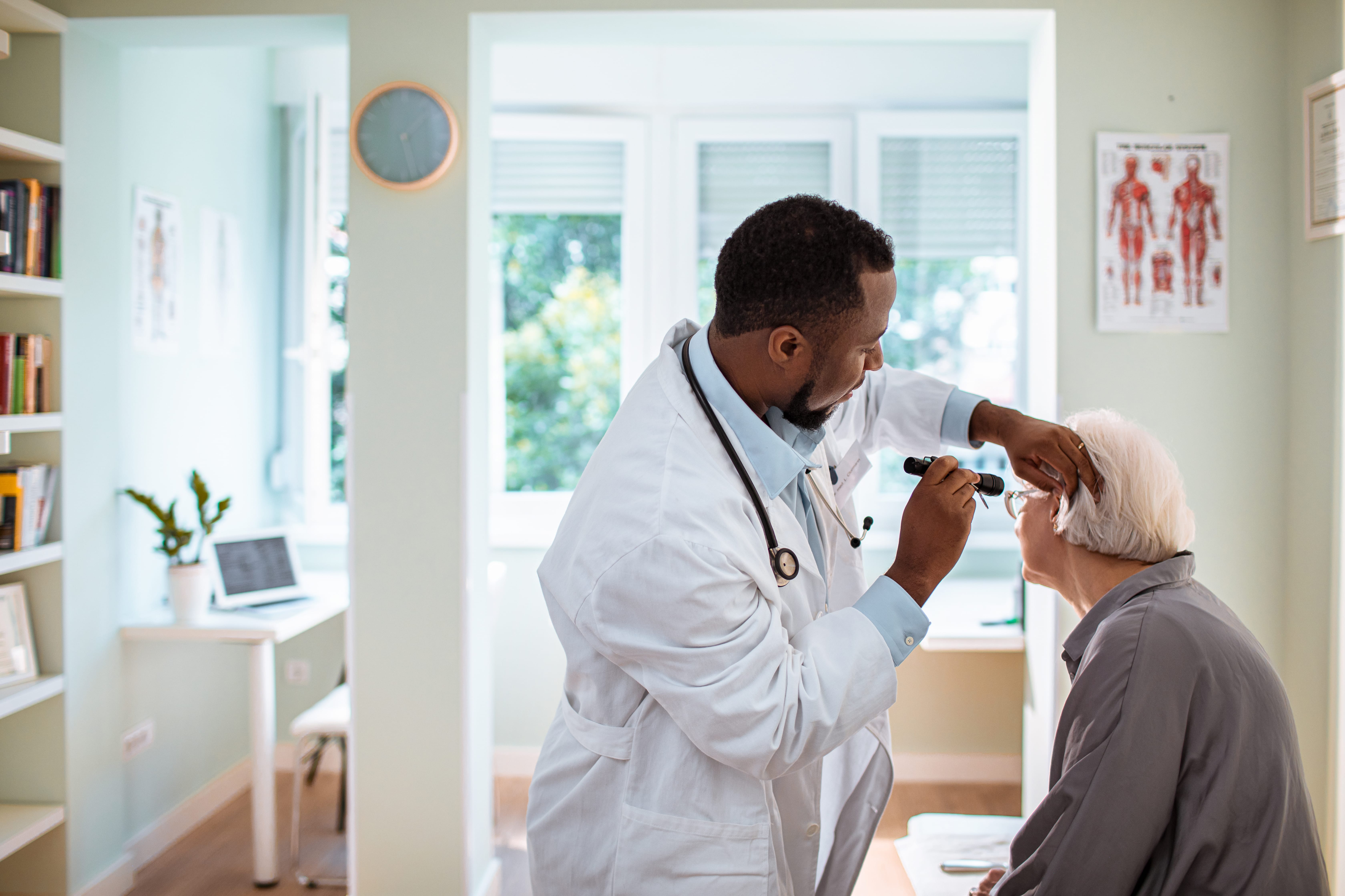 Doctor testing hearing