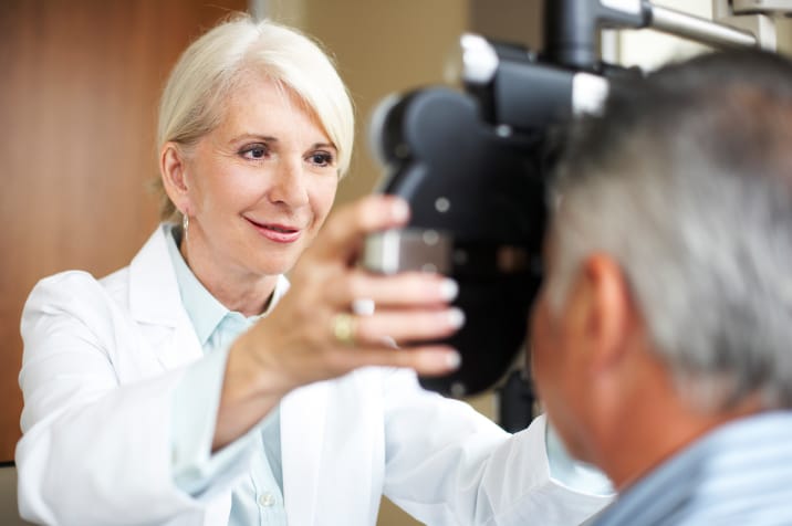 Optometrist providing care